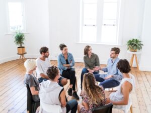 Group therapy session for healing childhood trauma with a focus on therapy for childhood trauma in a supportive setting